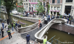 MX3D’s 3D-printed bridge being opened by Queen Máxima of the Netherlands in Amsterdam in July 2021.