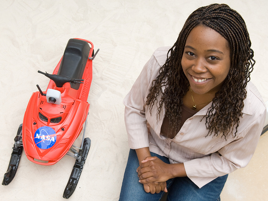 Ayanna Howard with a SnoMote, a robot designed to gather scientific data in ice environments. Photography by Rob Felt/Georgia Institute of Technology