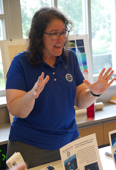 Laura Guertin sharing her oceanographic knowledge with visitors at the Q?rius Lab in the Smithsonian Institution’s National Museum of Natural History.