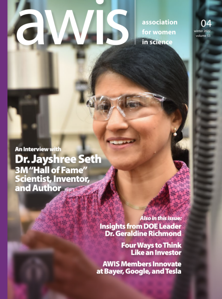 AWIS Magazine Cover featuring a photo of Dr. Jayshree Seth wearing safety goggles
