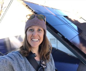 Riley Neugebauer pauses for a selfie after all the modules are installed on this residential project. 