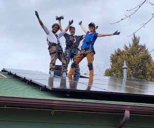 Brandon, Corey, and Riley celebrate the completion of this Namaste Solar Electric project in Colorado. 