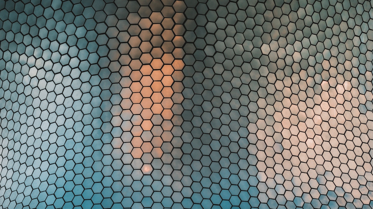 Shiny gray tiles in a honeycomb pattern